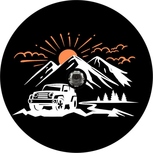 SUV in the Mountains with Sunset Spare Tire Cover